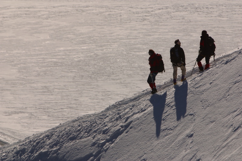 Men climbing mountain